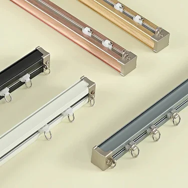 Curtain rail track system for curtains and sheers