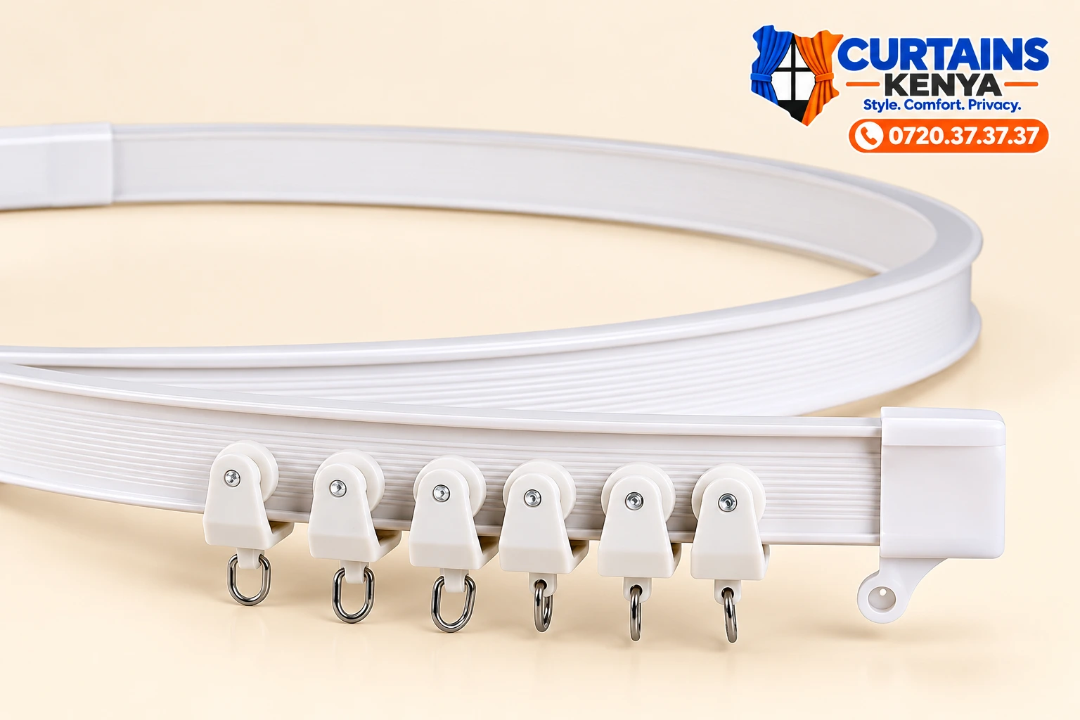 White bendable curtain rack curved into a loop, shown with curtain runners, metal attachment loops and an end fitting.