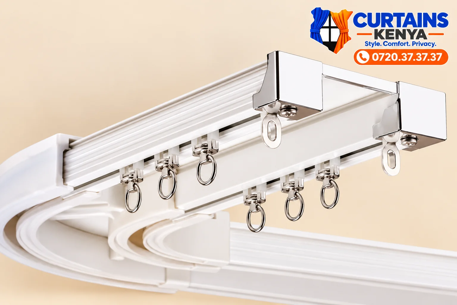 White double curtain rails with curved bend sections, runners, metal attachment loops and silver-tone end fittings.